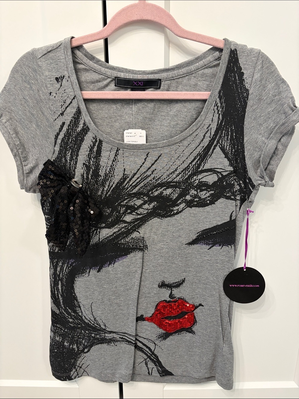 Graphic Tee with Black Sequin Bow and Red Lip Accent